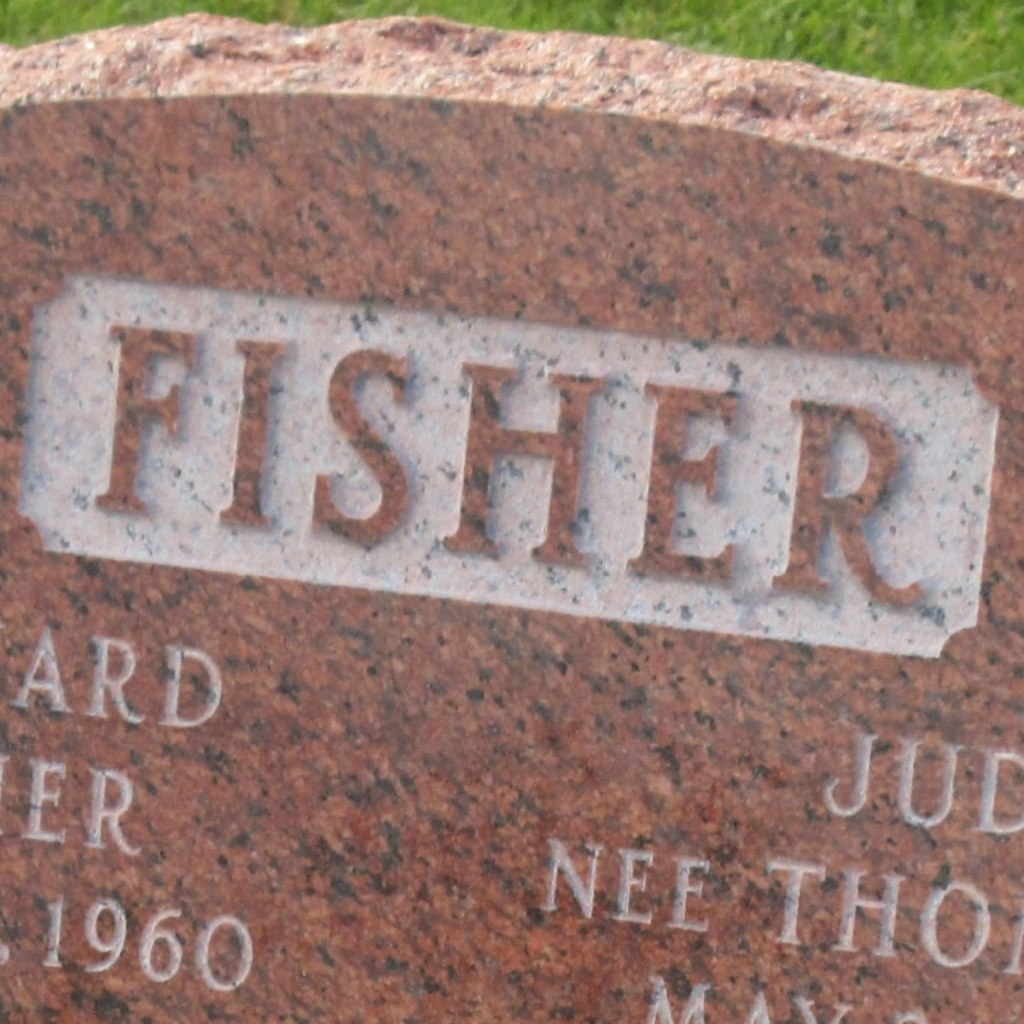An example of raised lettering on a granite monument.